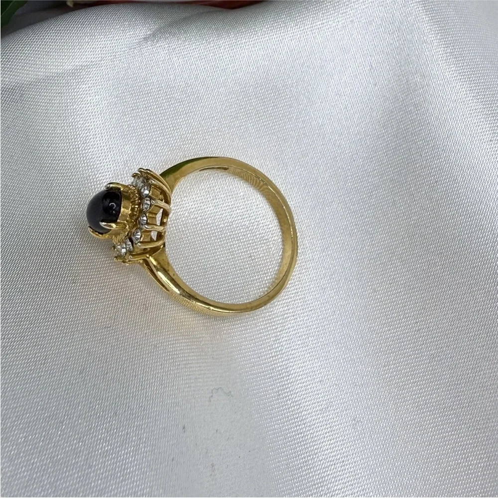 18K Gold Ring with Black Center Stone and Clear Accent Stones